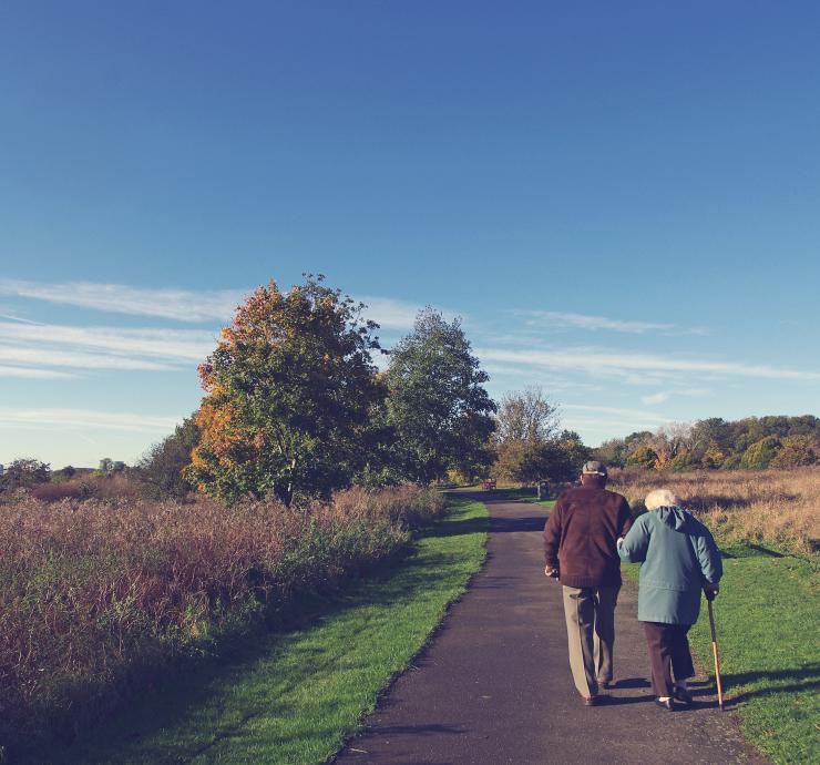 Old Couple Walking in Nature Old Couple Walking in Nature